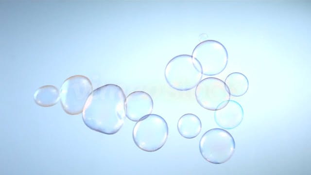 Bubbles floating over blue background...