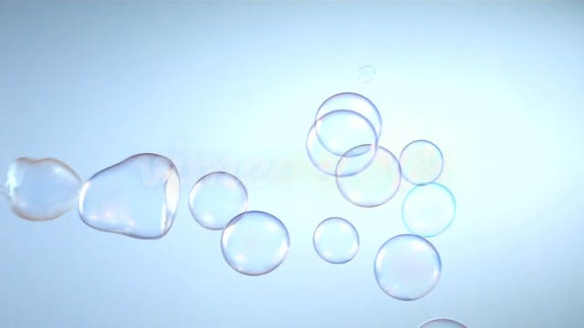 Bubbles floating over blue background...
