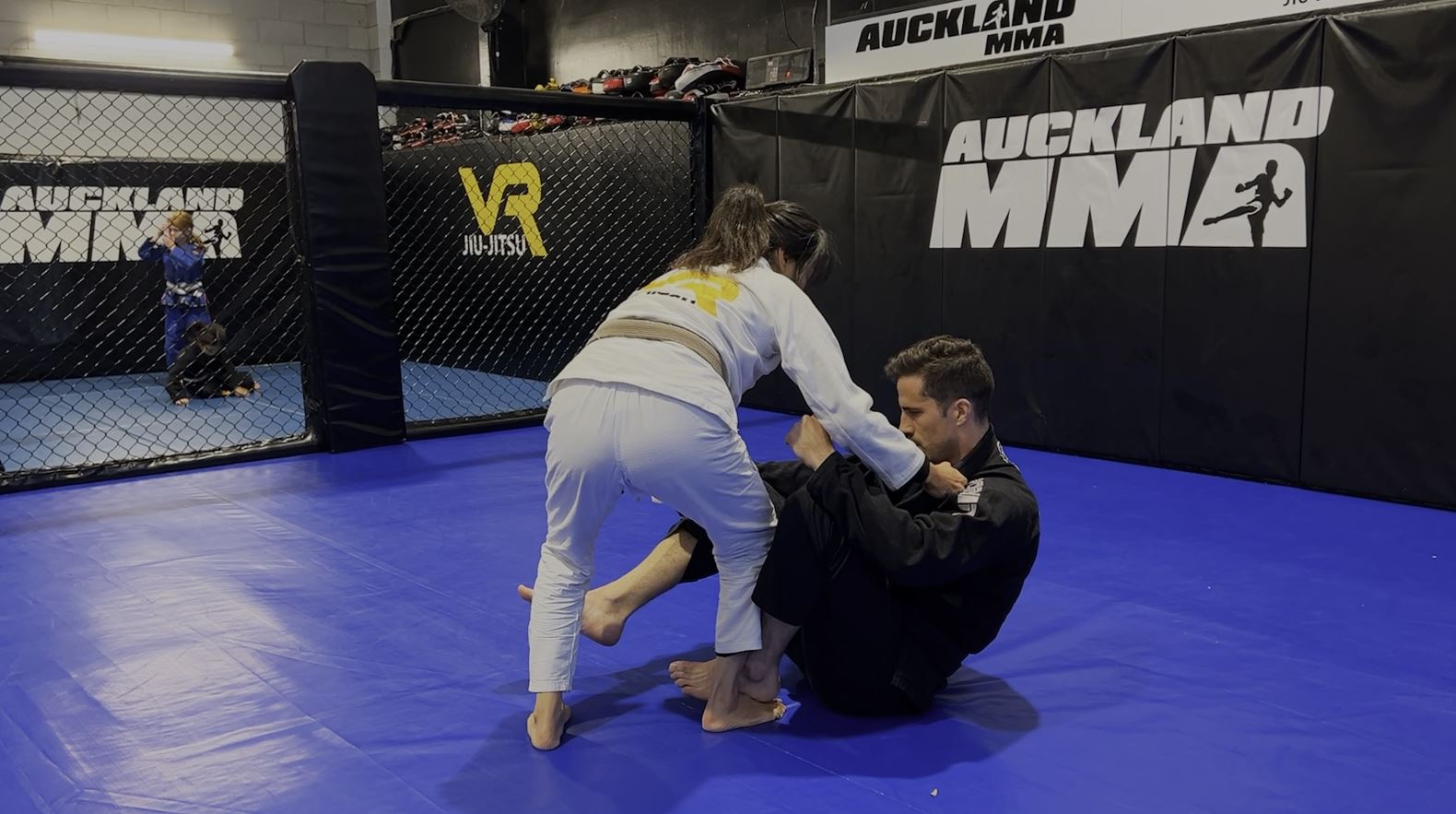 Same Side Shin-on-shin Passing of Seated Guard using Collar & Pant Grips