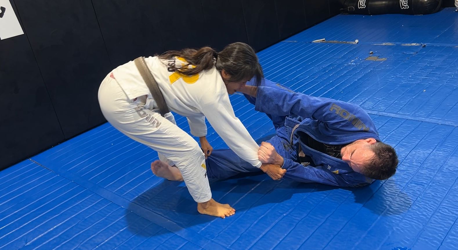 Rug Pull Pass of the Guard Pull with foot on hip