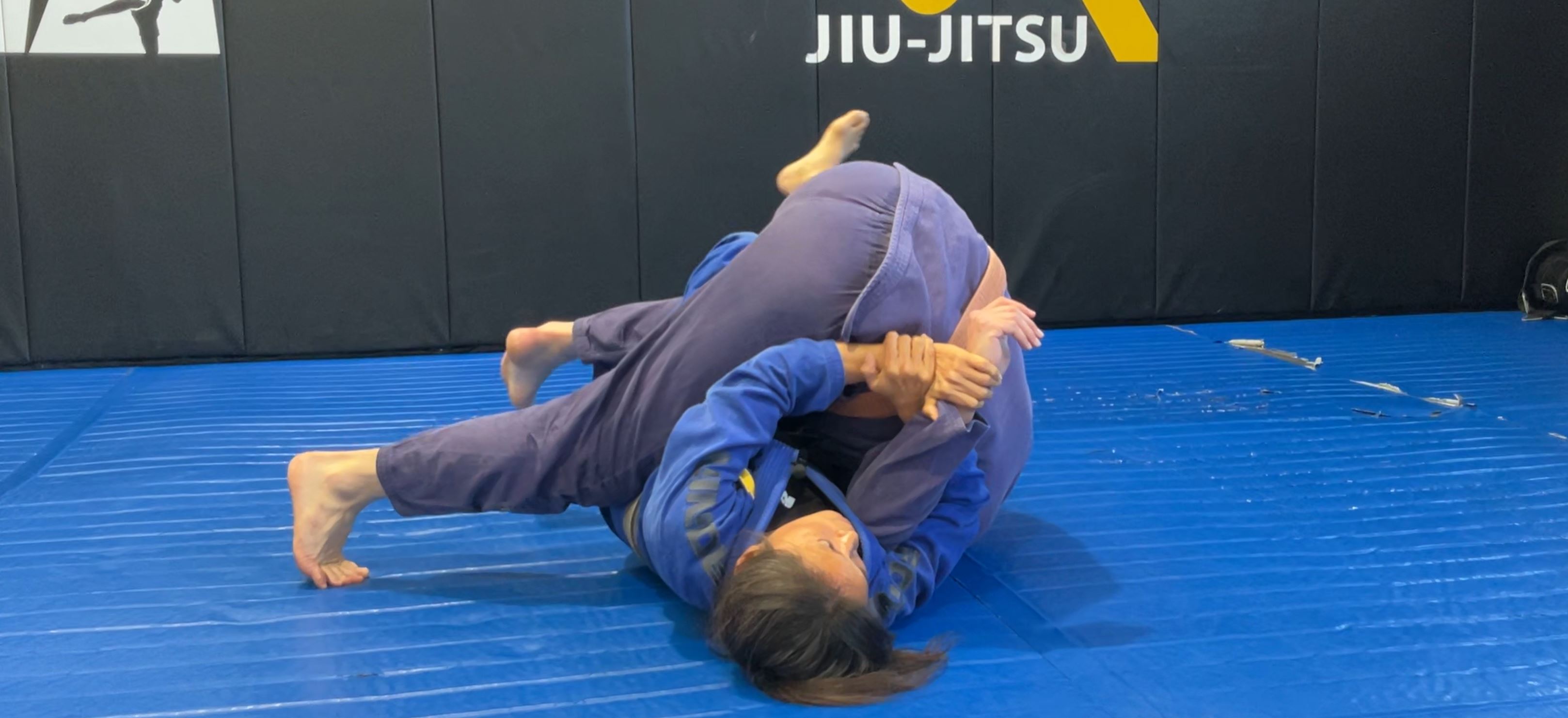 Kimura from Kneeshield bottom position