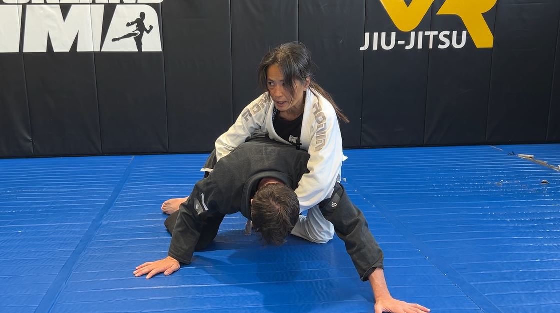 Backtake from Underhook Half Guard