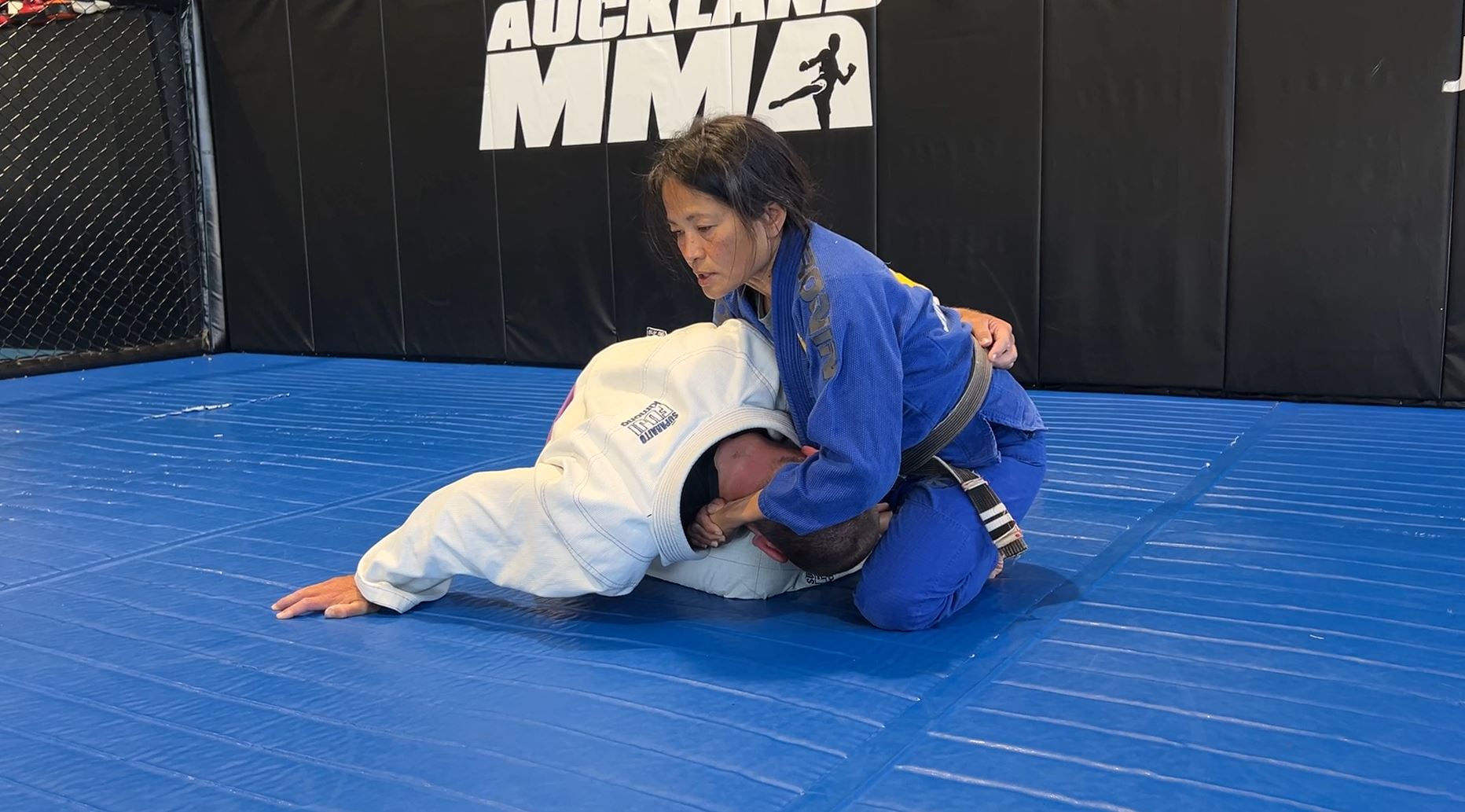 Japanese Necktie Choke from Underhook Half Guard top