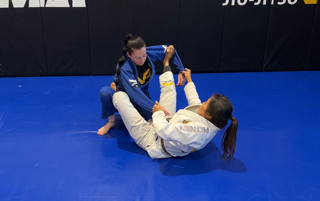 Lasso Sweep, Triangle, Omoplata, or Armbar from opponent's combat base