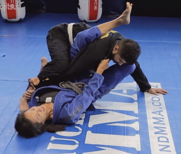 Omoplata Sweep from Closed Guard with Cross-Sleeve Grip