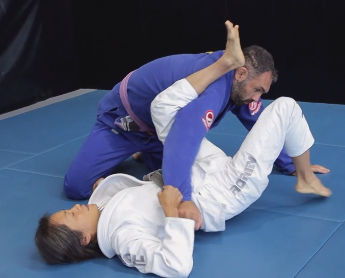 Cross Guard to Omoplata when opponent stands up