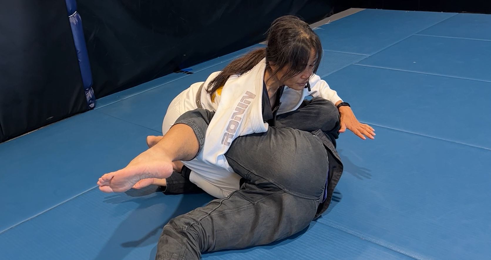Omoplata Counter by Stepping Over Head