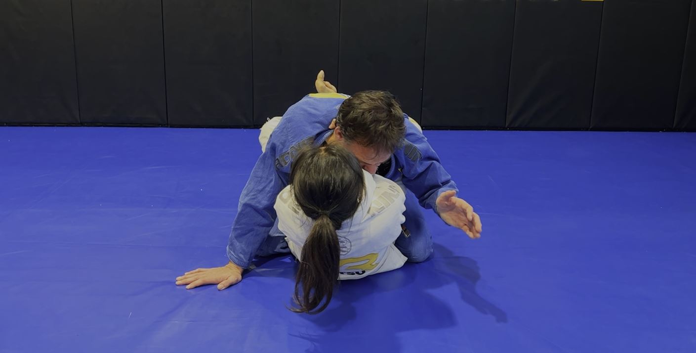 Cross Collar Choke from Closed Guard using two perfect collar grips