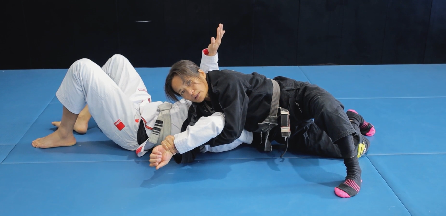 Kimura from side control by rolling wrist inwards and moving to same side