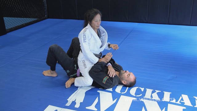 Rotating to keep the armbar from mount