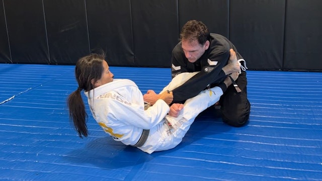 Lasso sweep by hooking the far armpit