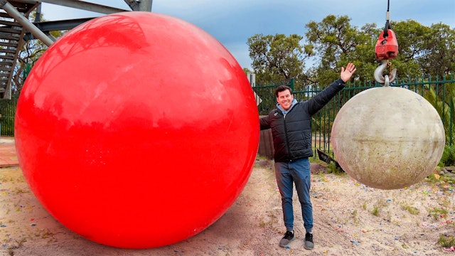 Can The World's Largest Exercise Ball Bounce This Stone