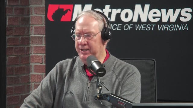 Dave talking with Coach Bryan Poore a...