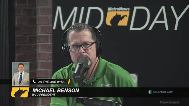 WVU President Michael Benson talking ...