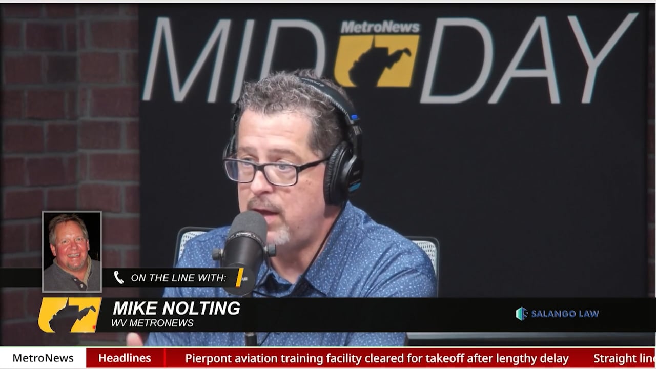 Dave A Mike Nolting talking about WVU students moving in on campus