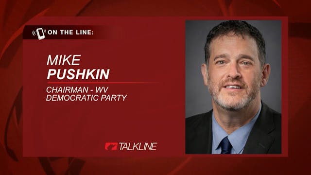 Democratic Party Chair Mike Pushkin r...