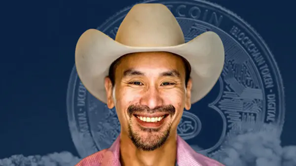 Jimmy Song, Bitcoin developer and educator, wearing a cowboy hat against a blockchain token background.